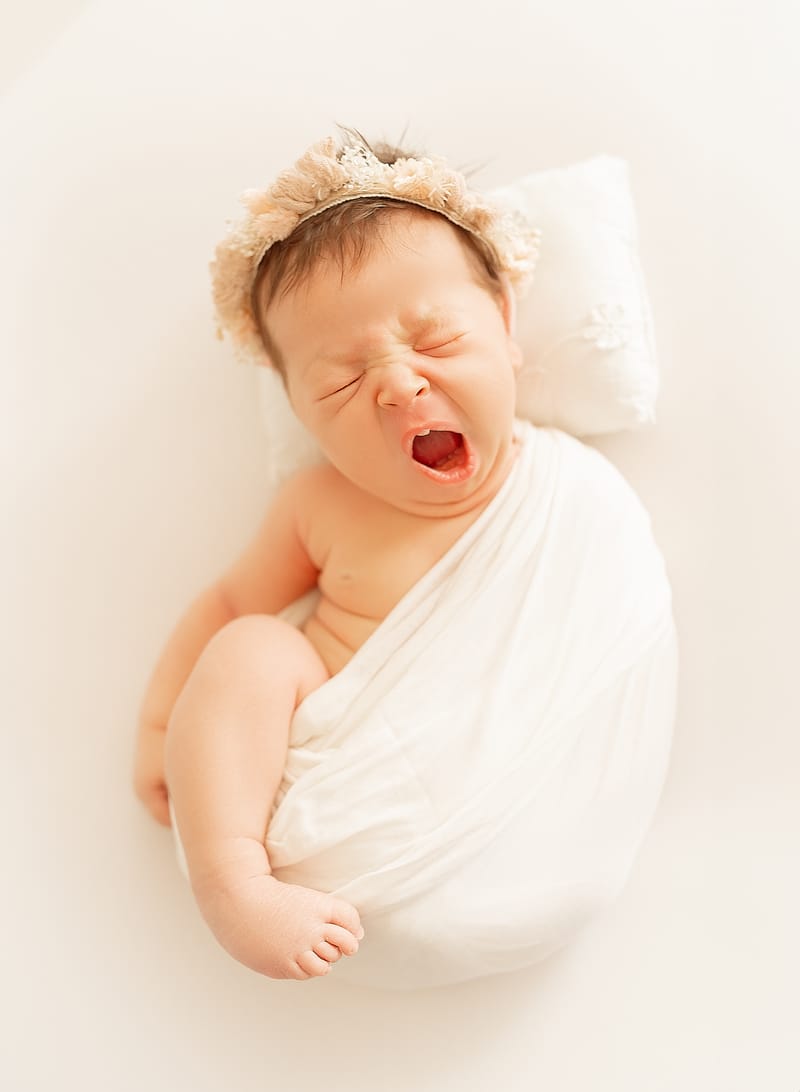 צילומי ניובורן בסטודיו או בית הלקוח