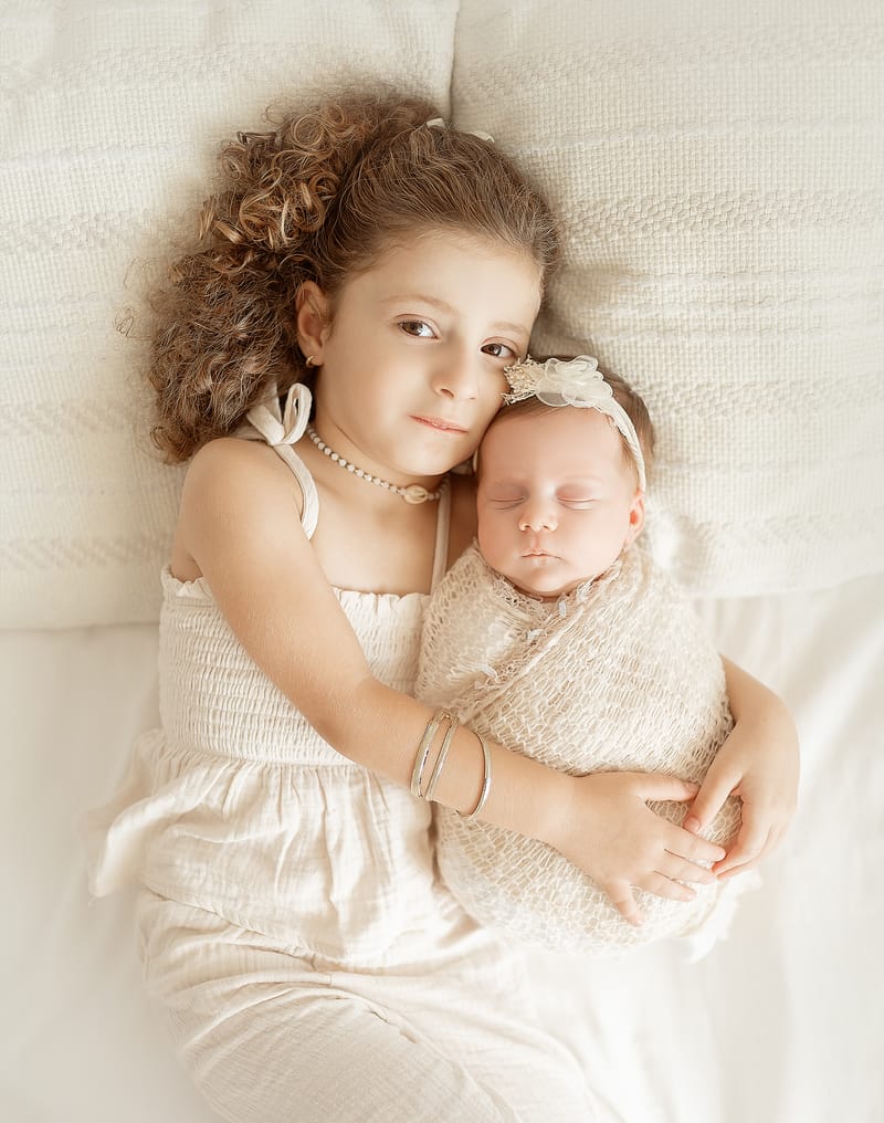 צילומי ניובורן בסטודיו או בית הלקוח