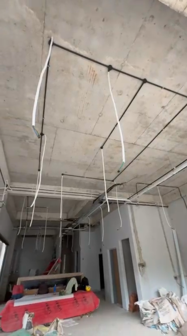 HDB rewiring installation Singapore electrician working on ceiling wiring