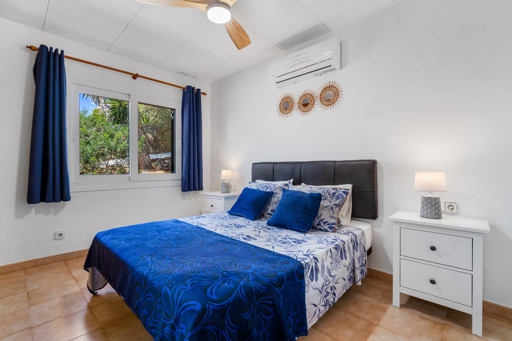 Main bedroom.  Fitted double wardrobe.  En-suite shower room.  A/C & quiet ceiling fan
