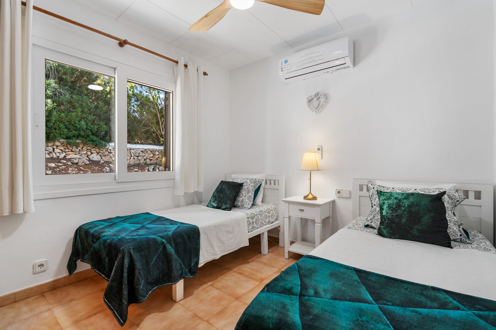 Bedroom 2.  Fitted double wardrobe. A/C & quiet ceiling fan.