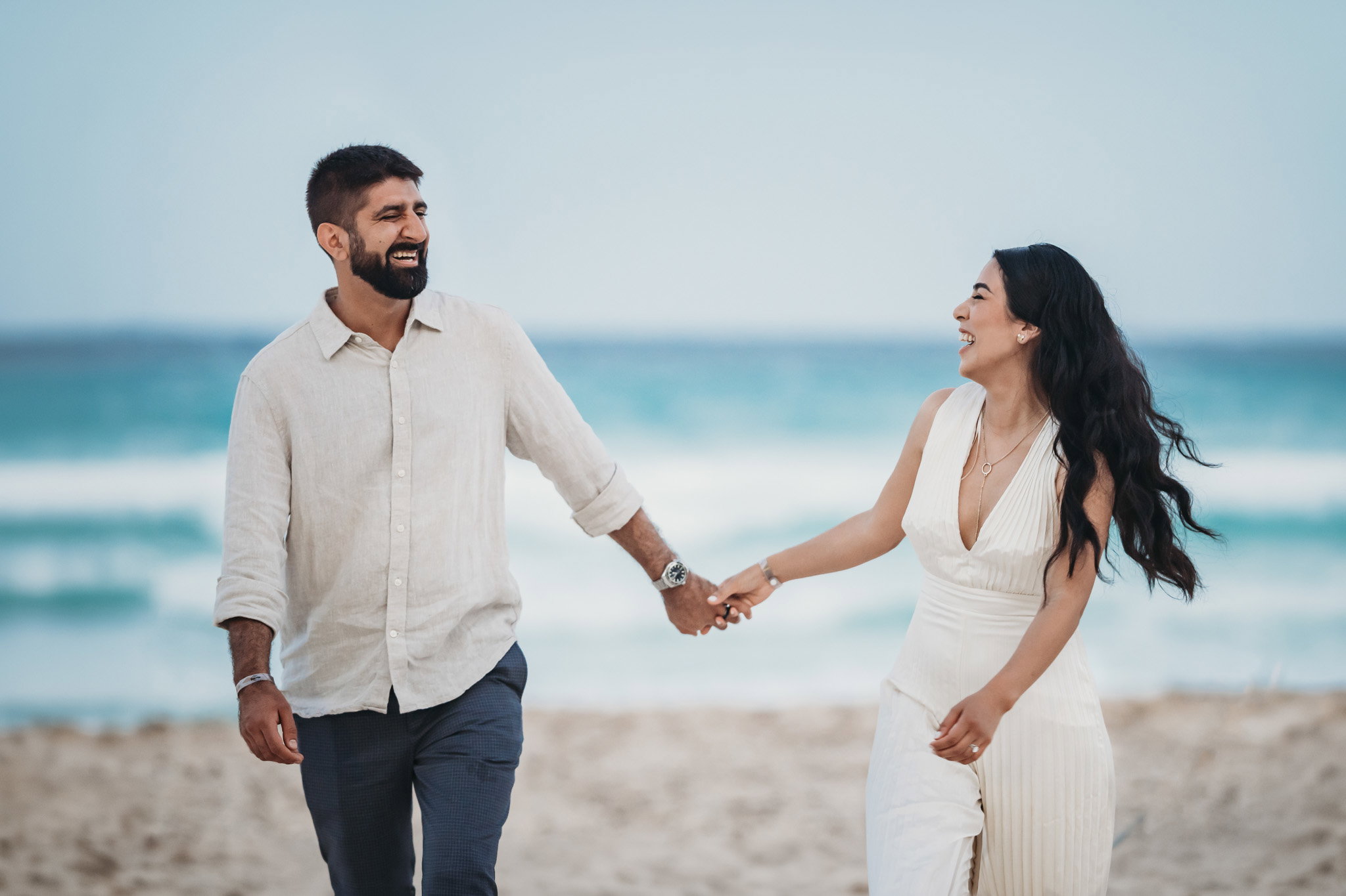 Bride and groom on Cancun beach