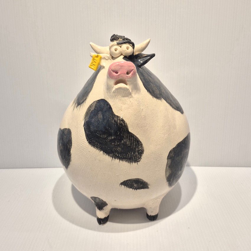 "Large Mad Friesian cow"