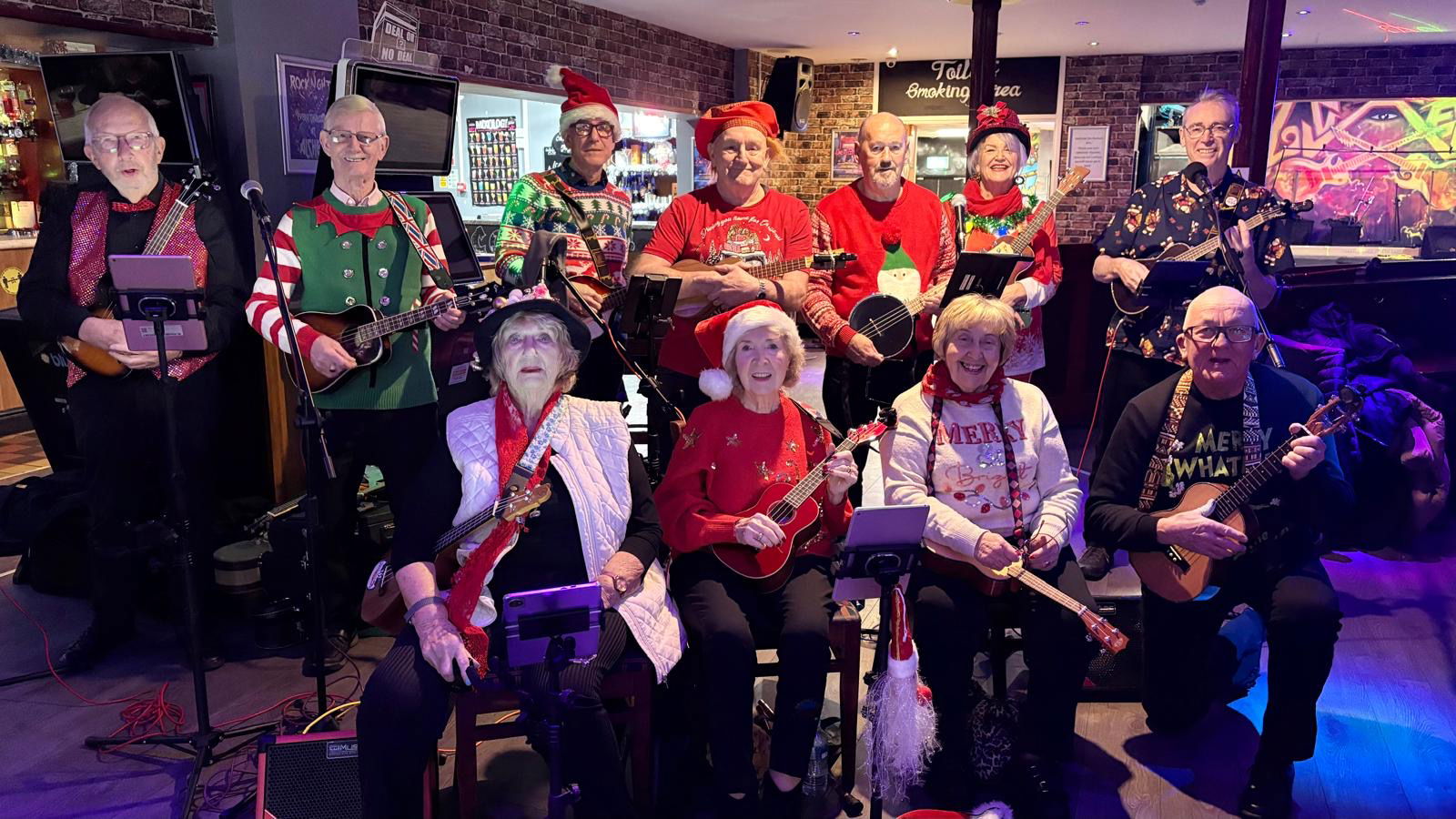 The D'Ukes of Halton Ukulele Band performed at The Alchemy pub in Runcorn on Thurs 18th December 2025