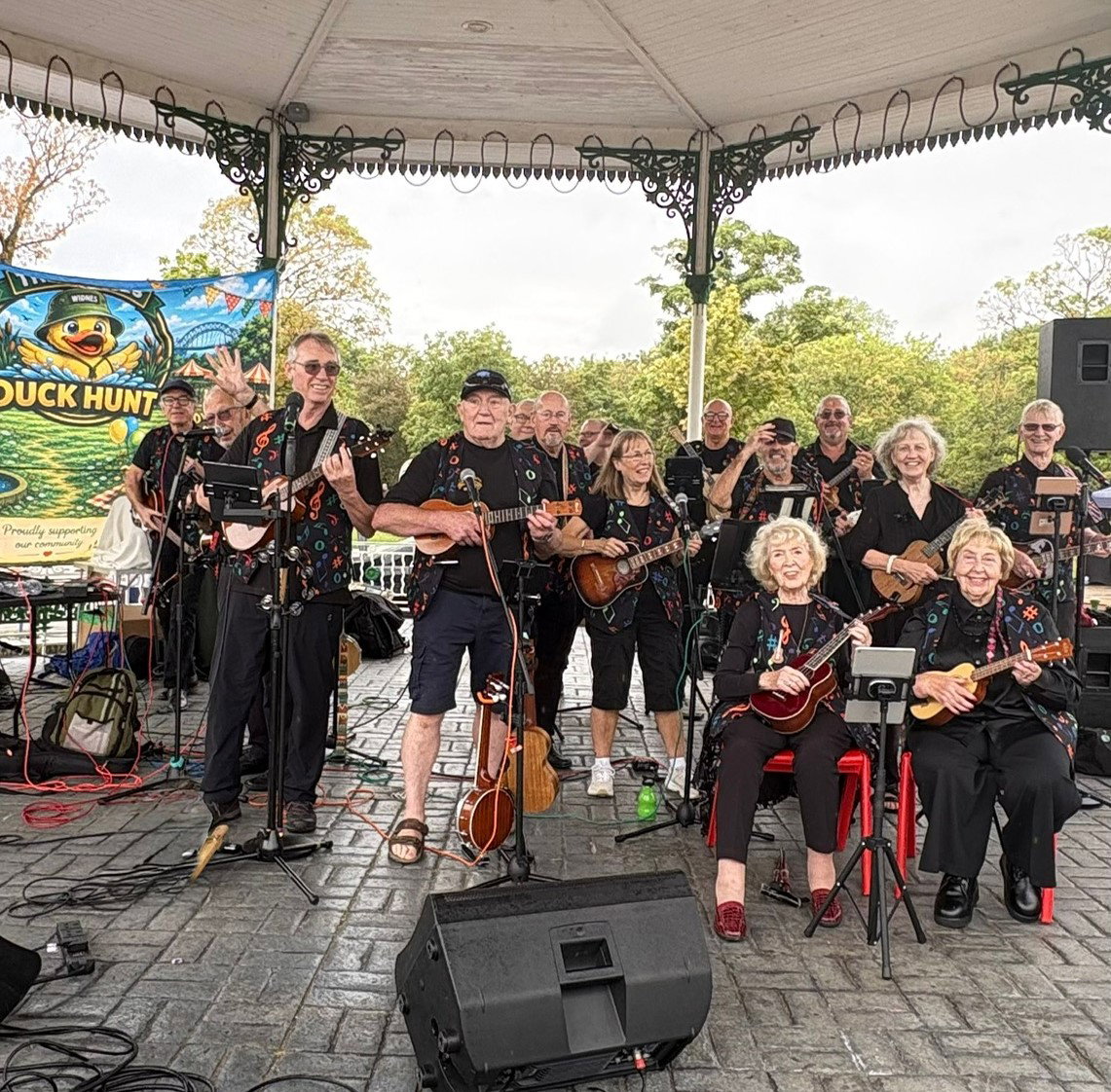 The D'Ukes of Halton Ukulele Band played at the Duck Hunt Festival in Victoria Park, Widnes 30the August 2026