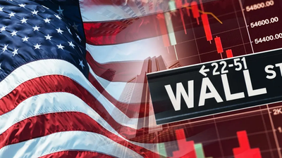 وول ستريت تترنح… والعقود الآجلة تستقر بانتظار قرار الفائدة