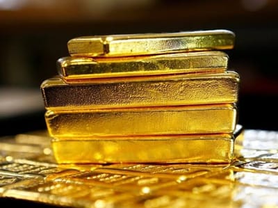 الذهب يتراجع بأكثر من 1% بعد قرار الفيدرالي برفع الفائدة