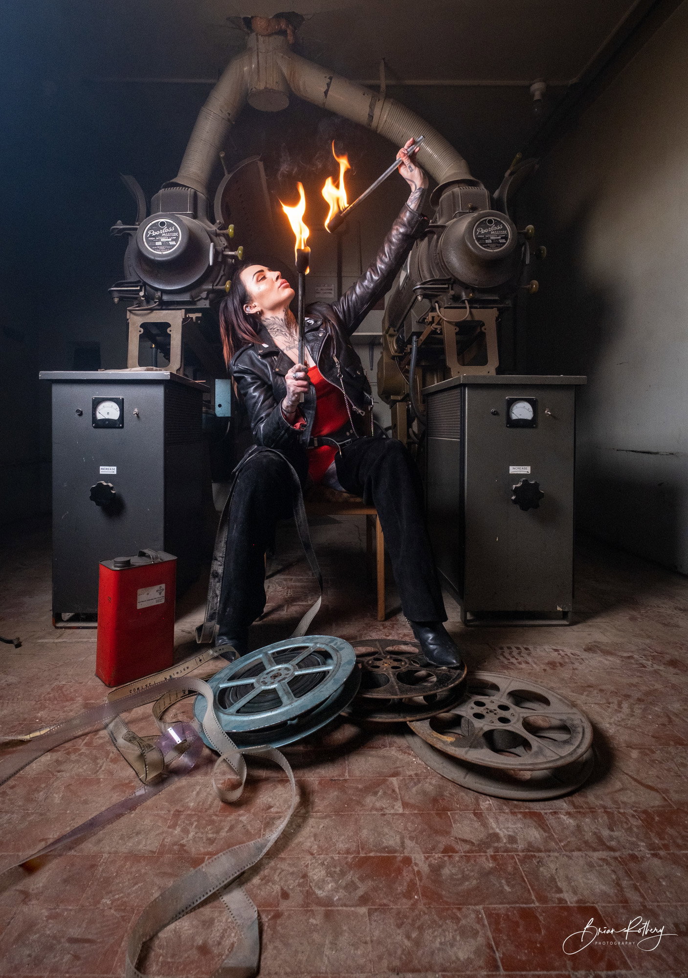 Nicola with fire sticks in old projection room