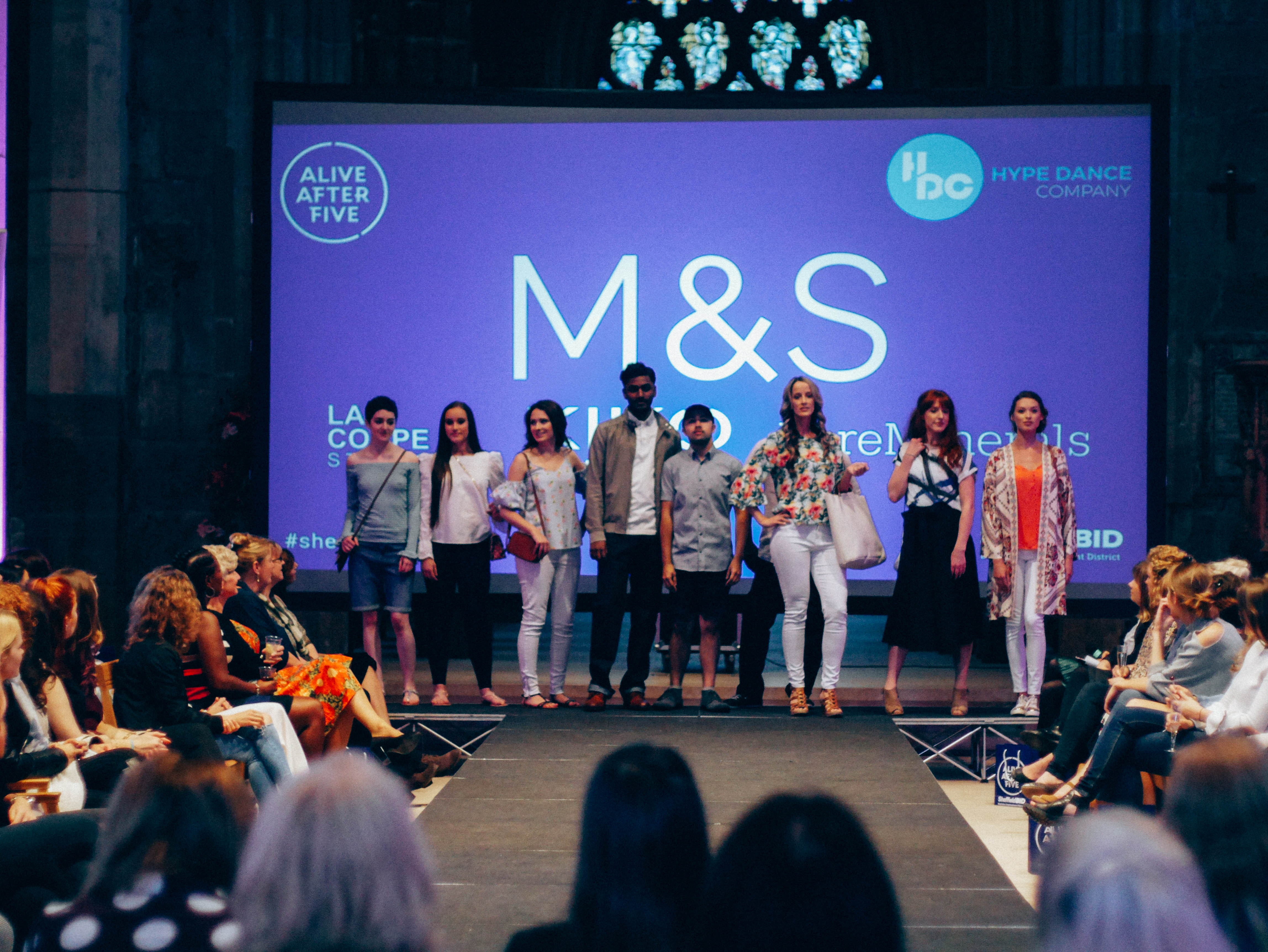 People attending a fashion show in Sheffield city centre as part of Alive After 5