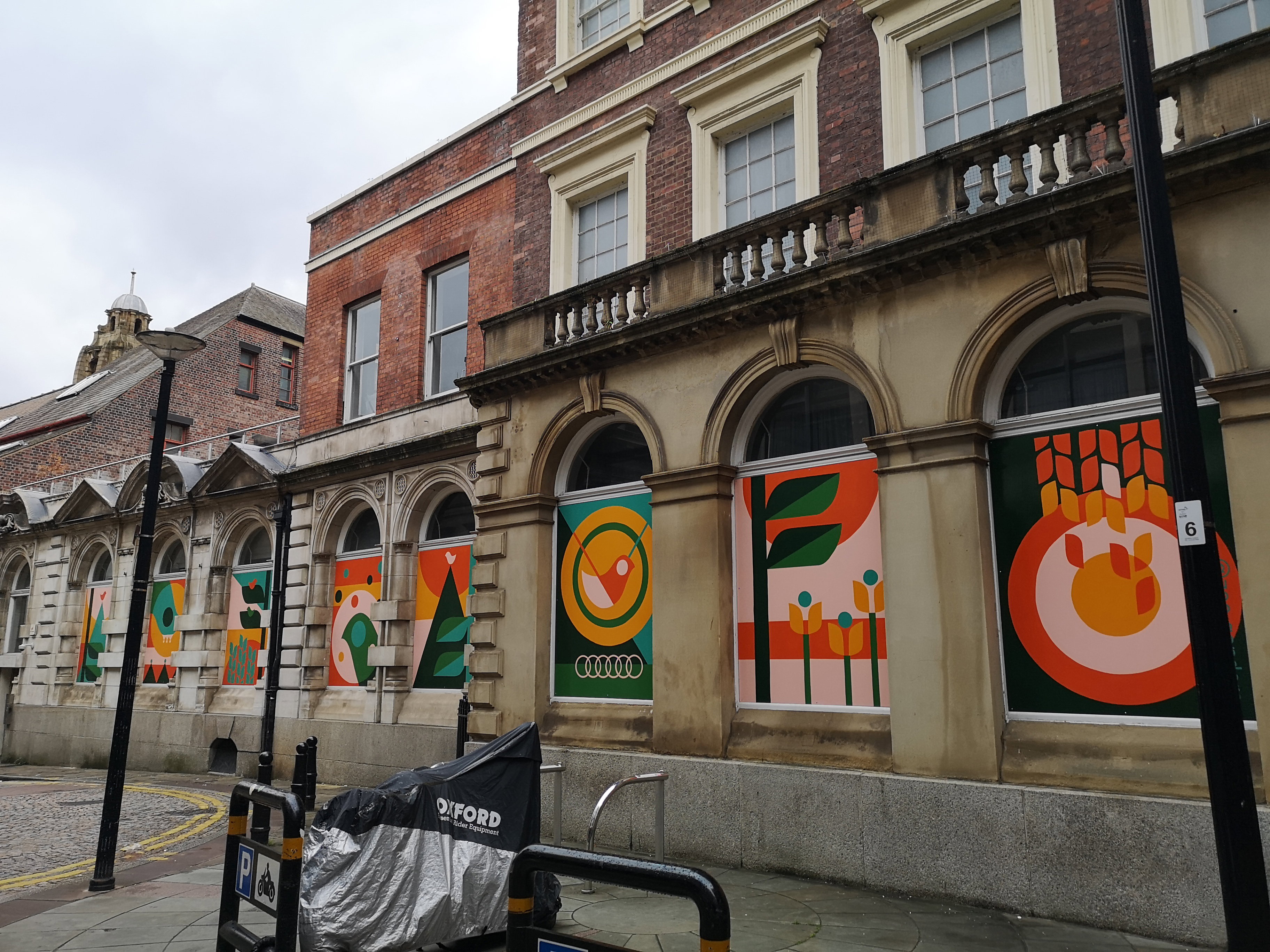 Colourful art panels on the former Curzon Cinema frontage on George Street