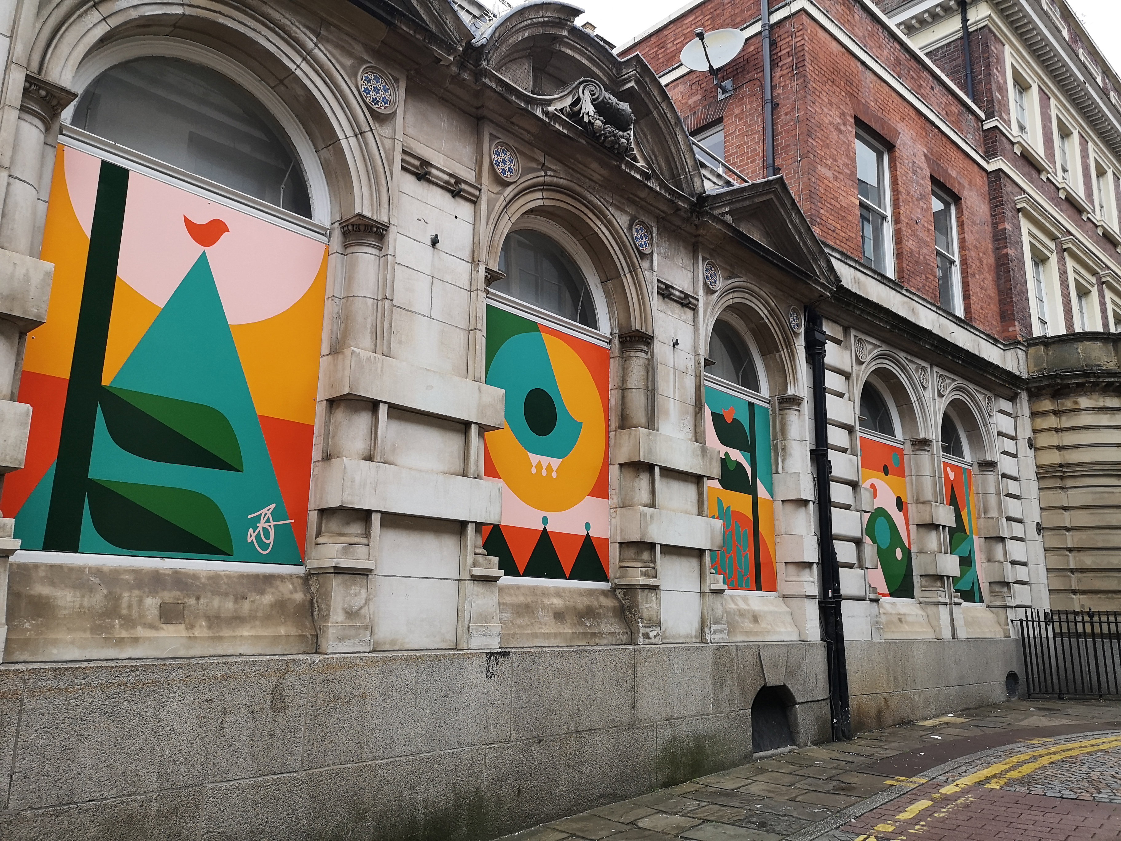Colourful art panels on the former Curzon Cinema frontage on George Street