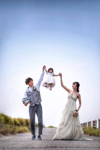 海ロケで家族写真