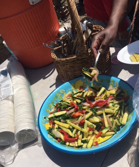 Red and yellow peppers with zucchini