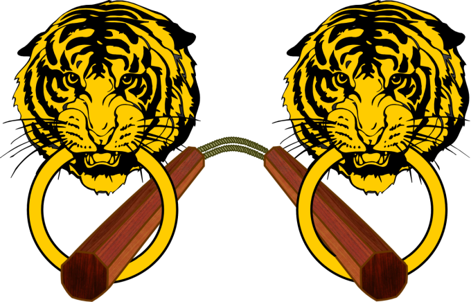 Two tiger heads on a gate holding a nunchaku, representing the past and the future.