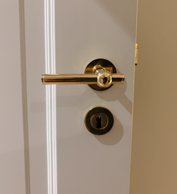 Studio Damm offers solid unpolished brass handles and hinges