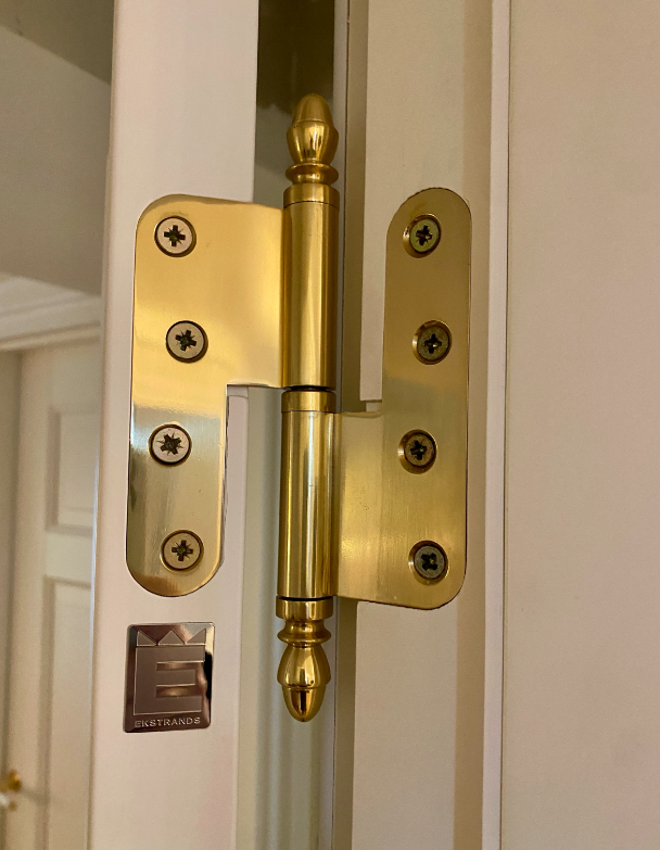 Studio Damm offers solid unpolished brass handles and hinges