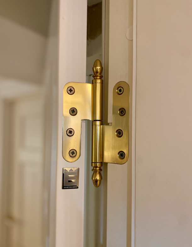 Studio Damm offers solid unpolished brass handles and hinges