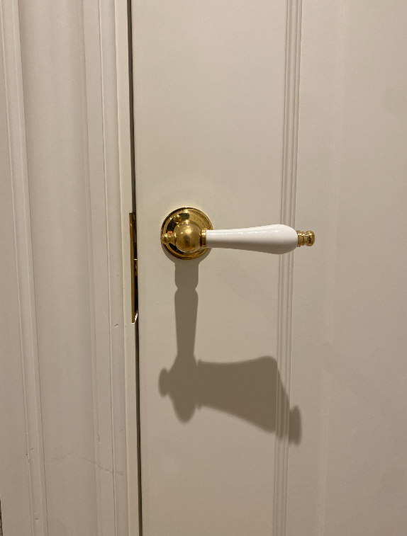 Studio Damm offers solid unpolished brass handles and hinges