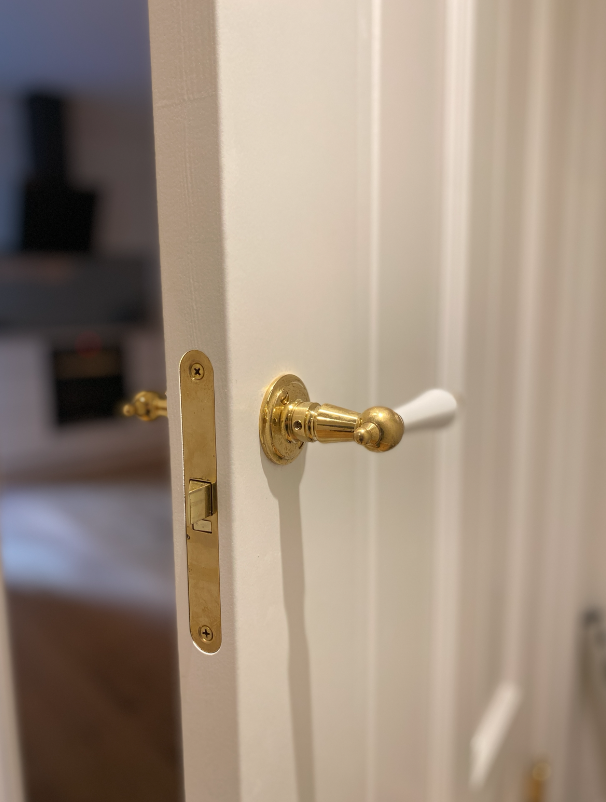 Studio Damm offers solid unpolished brass handles and hinges