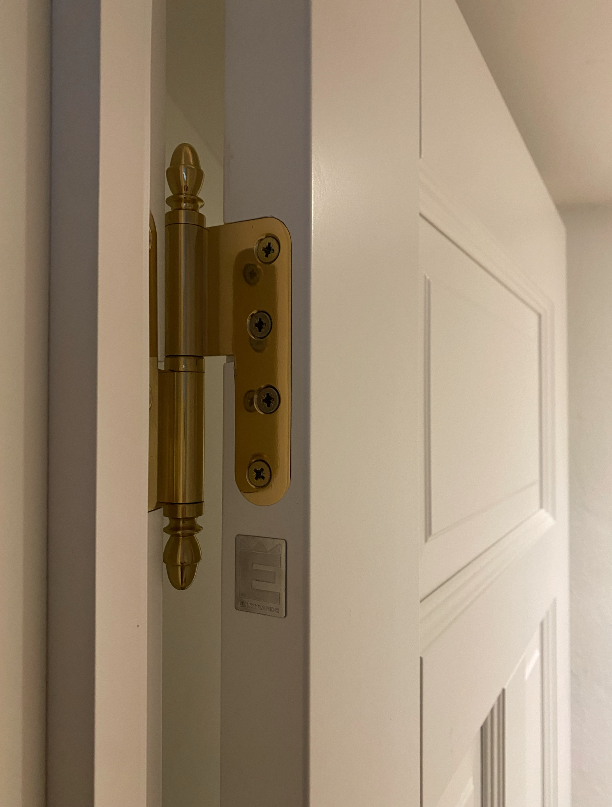 Studio Damm offers solid unpolished brass handles and hinges