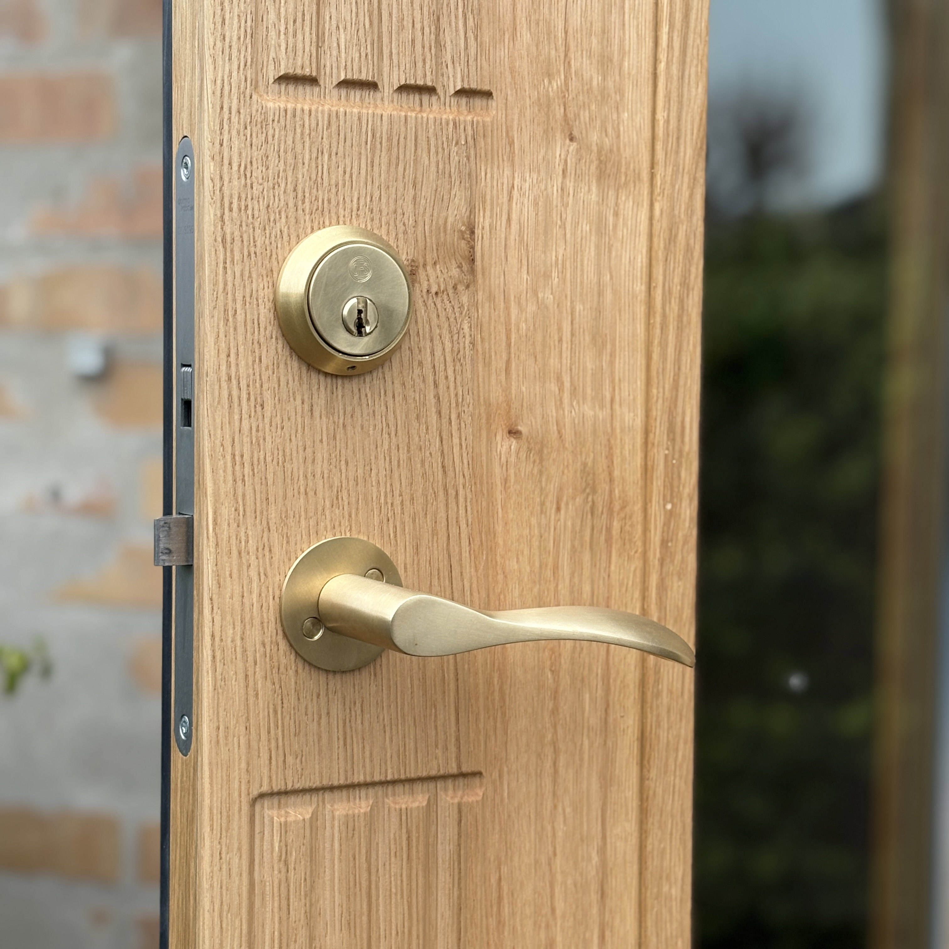 Studio Damm offers solid unpolished brass handles and hinges