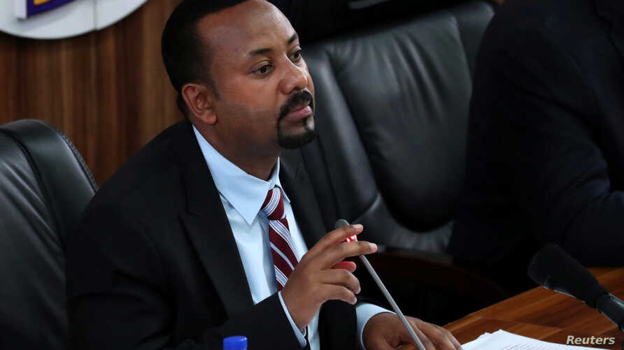 Ethiopia’s Prime Minister Abiy Ahmed speaks during a session with the Members of the Parliament in Addis Ababa, Ethiopia,…