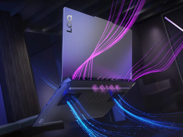 Lenovo LOQ 15IRX9 gaming laptop – left-rear and bottom view, with colored lines illustrating heat expulsion