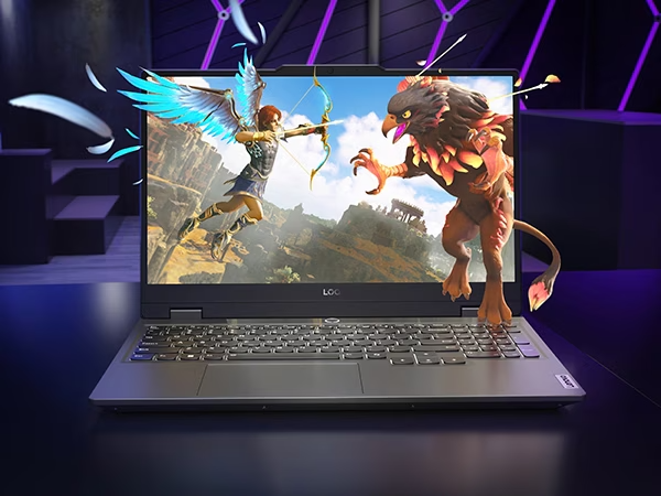 Lenovo LOQ 15IRX9 gaming laptop – front view, lid open, with game scene on the display and fighting characters seeming to pop out of the display