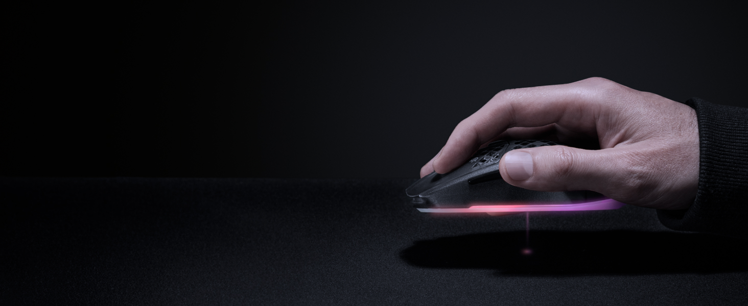 Image of hand on mouse with RGB glow demonstrating lift off distance