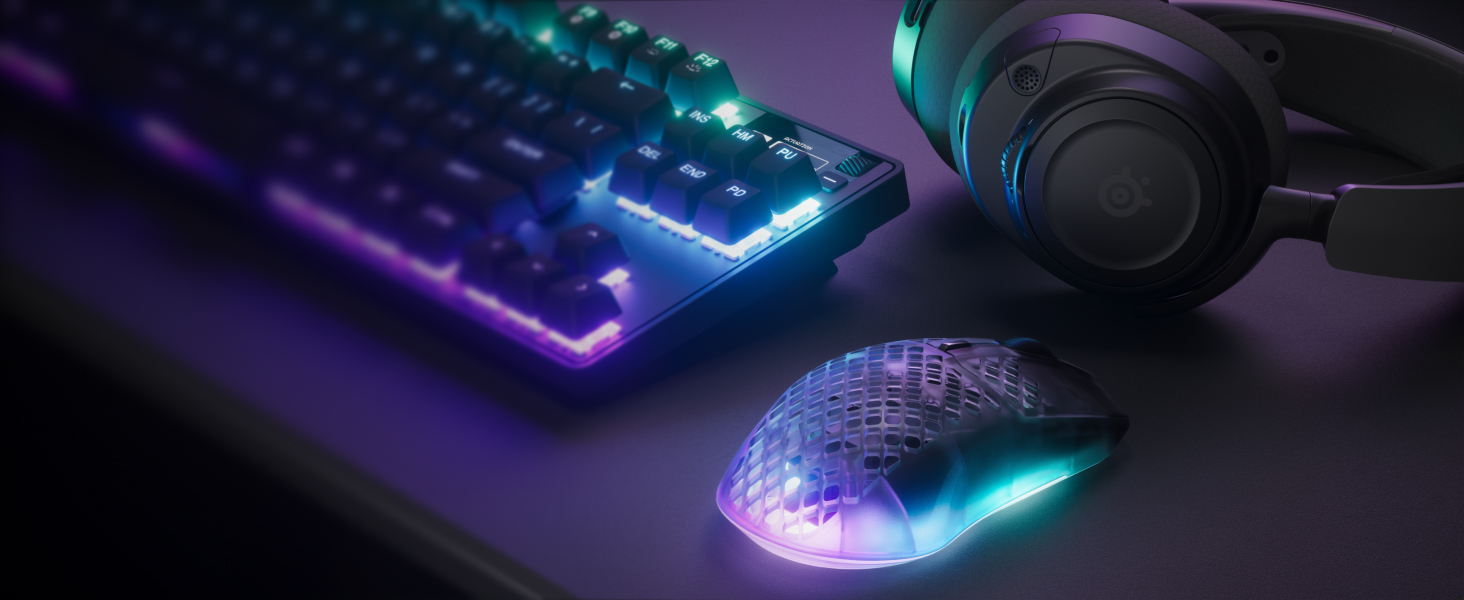Image of mouse, keyboard and headset in shadow black