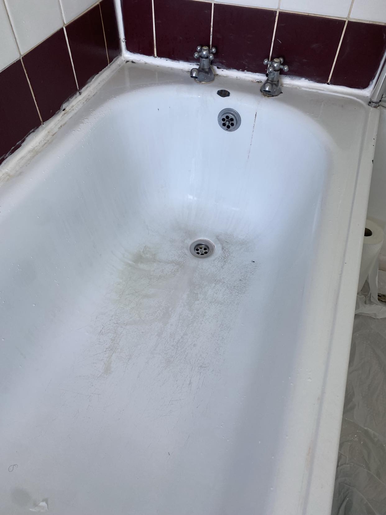 badly stained enamel bath
