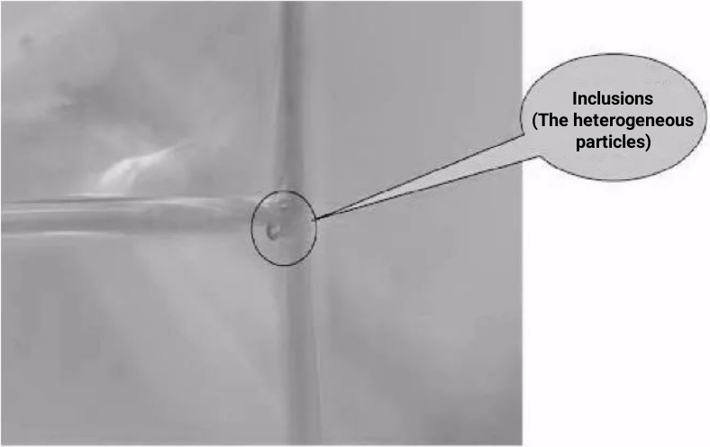 Figure 8 Magnified view of heterogeneous particles from the self-explosion source of tempered glass