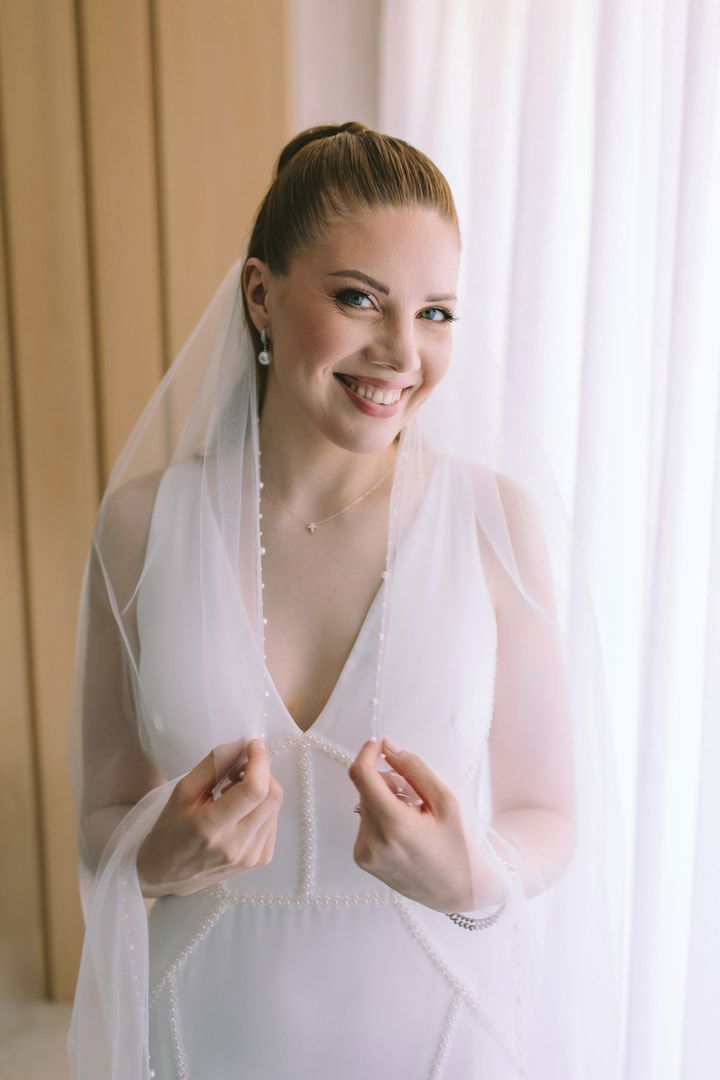 A Love Story Sealed in Sunlight and Sea Breeze: The Wedding of Jordan & Alexandra