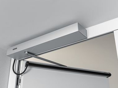 How Do Automatic Sliding Doors and Swing Handicap Operators Improve Accessibility in Commercial Spaces?