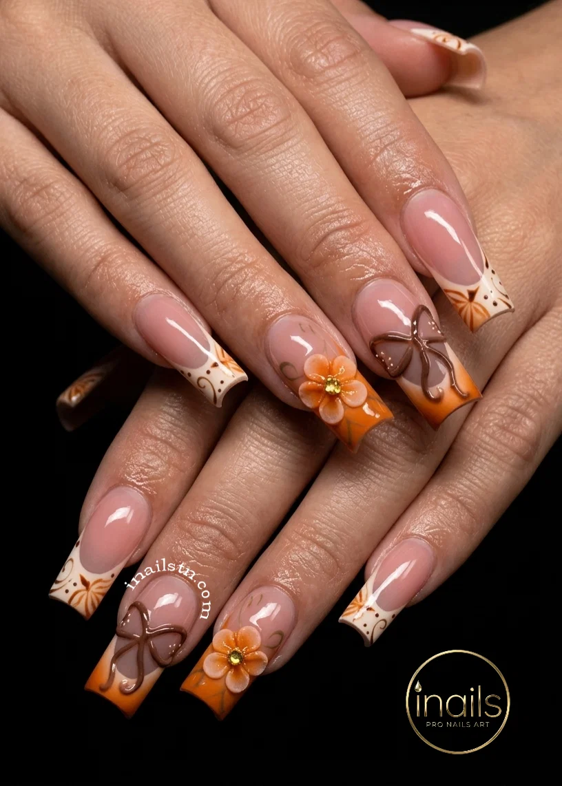 Bronze velvet magnetic cat-eye autumn manicure with gold foil accents