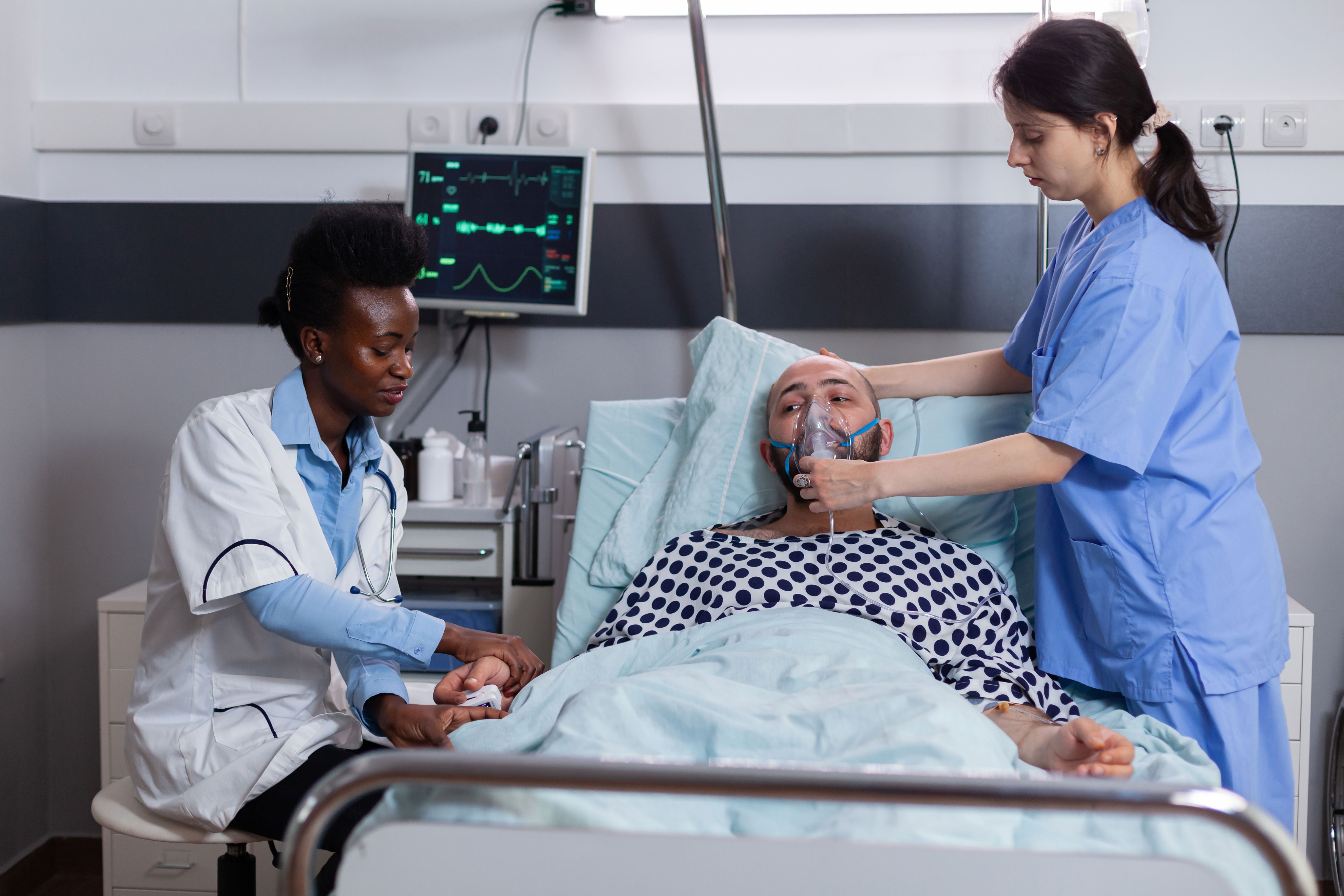 Doctor examining breathless patient