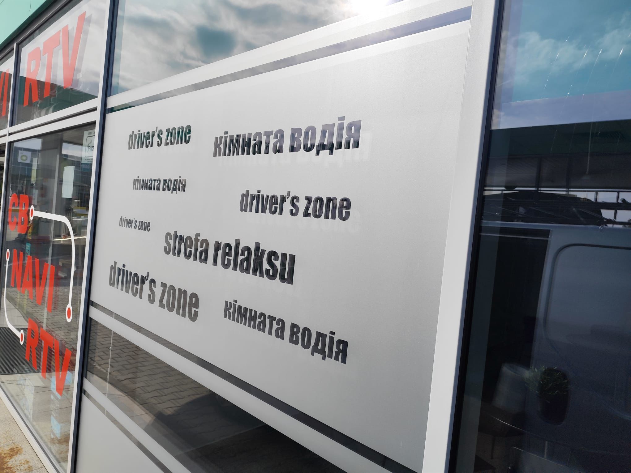 Covering shop windows with foil