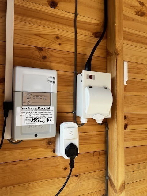 Garage consumer unit and garage door power