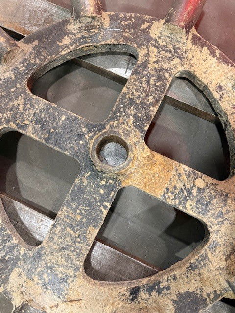 Broken shaft from a compaction wheel