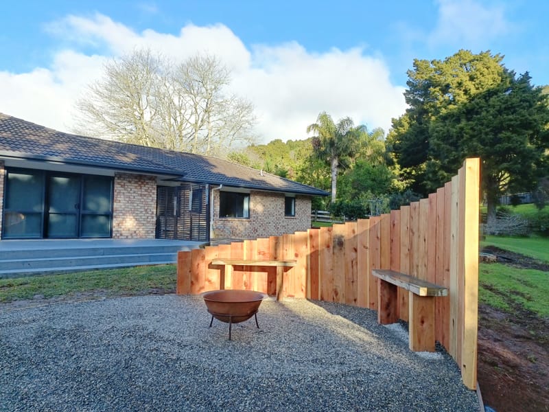 Vertical Timber Sleeper Wall and Firepit Area