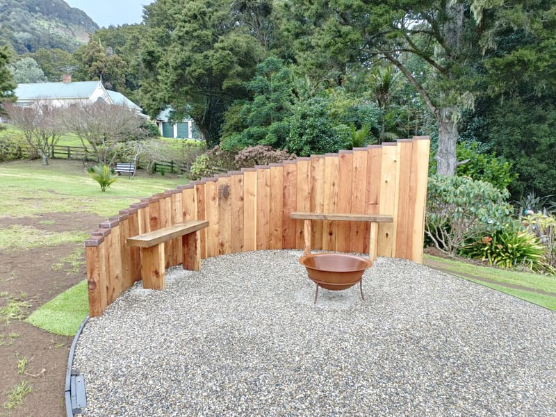 Vertical Timber Sleeper Wall and Firepit Area