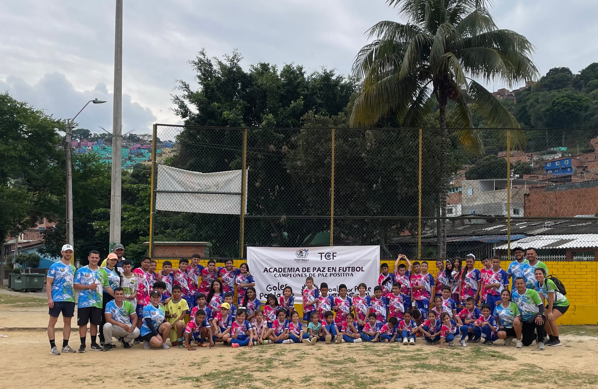Participants and Volunteers at the 1st Tournament of the Football Peace Academy in Olas Dos