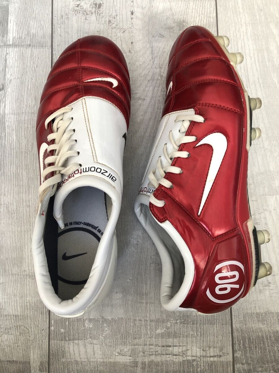 red and white total 90 boots