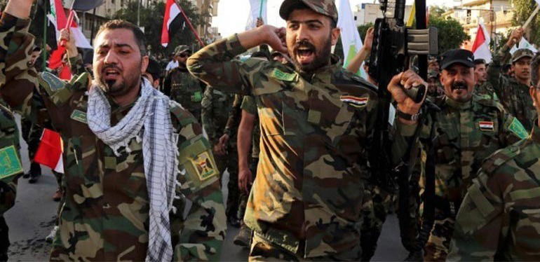 نيوزويك: فصائل مسلحة عراقية لا تثق بمصداقية بايدن بالانسحاب