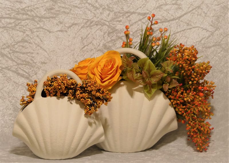 מבחר מרהיב של אגרטלים עם פרחי משי איכותיים