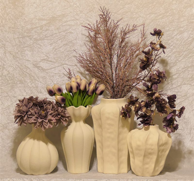 מבחר מרהיב של אגרטלים עם פרחי משי איכותיים