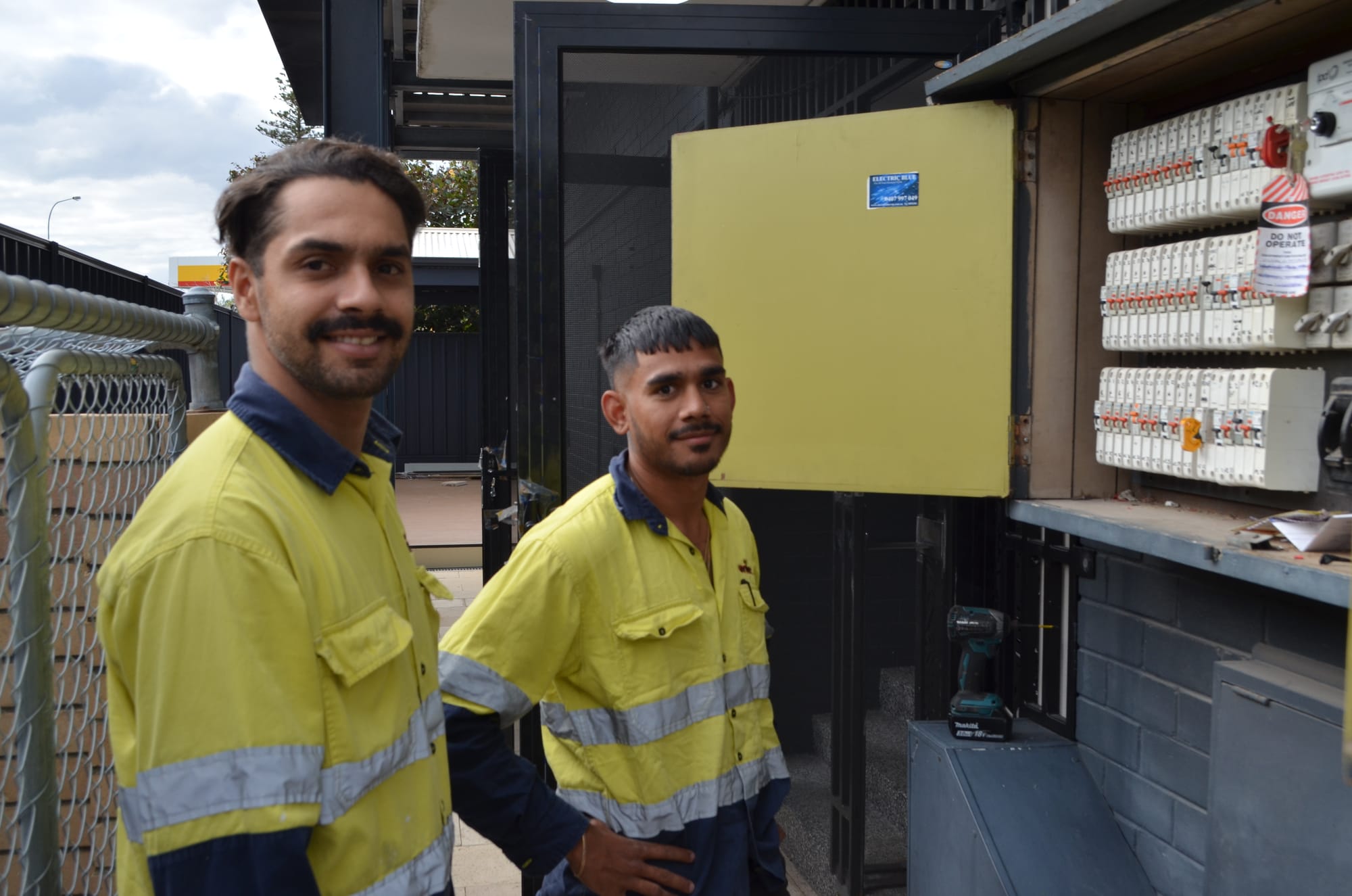 Wilco electricians at an Aboriginal Hostels Limited site