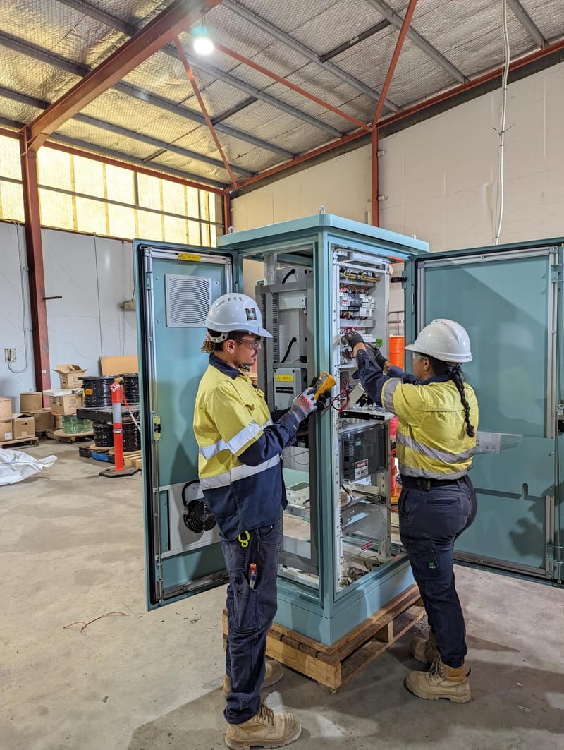 Wilco electricians upgrading an outdoor switchboard cabinet