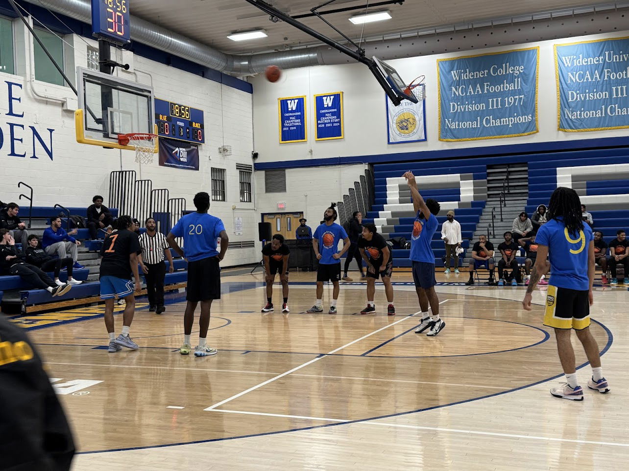 Players lined up for a foul shot during a basketball game