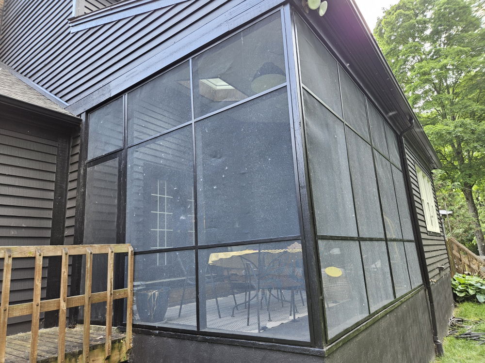 Replaced Porch Screening and Screened/Installed a New Door